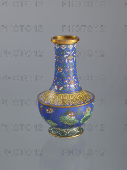 Vase, maker: Rubiec-Masalski; Fyodor Vasilyevich (1865–1920?); Tulisov, Jerzy (1943– ). Chinese art; Chinese; Qing (1644–1911); Boxer Rebellion (1899–1901). Cloisonné (enamel) vessel decorated with lotuses, lotus tendril (ornament), plant tendril, flower tendril, and waves; 19th century, China. Height 22.7 cm; diameter 12.5 cm.