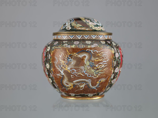 Vase with cover; Japanese; Meiji period (late 19th century, 1868–1912); cloisonné enamel; decorated with ho-o (phoenix), flowers, plant ornaments, geometric ornaments, and dragons (Japanese dragon motif); vessel. Dimensions: height 6.0 cm; width 26.0 cm; depth 19.5 cm.