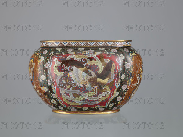 Vase with cover, Japanese, Meiji (late 19th century, 1868–1912); cloisonné enamel; decorated with phoenix (hoo), dragons, Japanese dragon motif, flowers, plant and geometric ornaments; vessel; height 6.0 cm, width 26.0 cm, depth 19.5 cm.