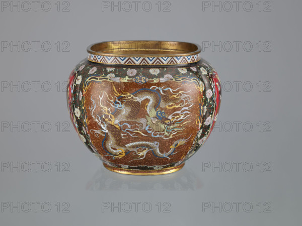Vase with cover; Japanese; Meiji (1868–1912), late 19th century; cloisonné (enamel); decorated with hoo (phoenix), flowers, plant ornaments, geometric ornament, dragons/Japanese dragon motif; vessel; height 6.0 cm, width 26.0 cm, depth 19.5 cm.