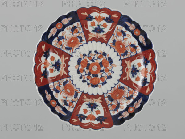Plate, Japanese, Meiji (1868–1912), Imari ware, floral motifs including lotuses, peaches (iconographic), and chrysanthemums, 19th/20th century, Japan; vessel, diameter 31.2 cm.