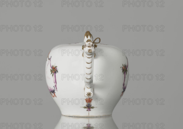 Teapot with lid, Koenigliche Porzellain Fabrique, Meissen (1710–1763); ca. 1750. Porcelain teapot with spherical belly tapering toward the base and flattened at the top; recessed flat lid with a pine-cone–shaped handle. Bipartite handle with plastic rocaille, mounted on the belly with volutes. Zoomorphic spout with relief acanthus-leaf motifs and a spout-head with a wide open mouth. On both sides of the body are cartouche frames featuring purple draperies suspended from the sides by small bouquets of flowers and dry rocailles, topped and bottomed on the axis of symmetry with brick-red draperies suspended by plant branches. Within the cartouches are purple camaïeu miniature landscapes with architecture: (1) a building with a defensive wall; (2) half-timbered buildings with a tower and a three-span bridge. Small colorful ornamental plant motifs under the handle and spout, two woodcut flowers and two insects on the top of the lid, and a small branch with a blue flower on the belly above t...