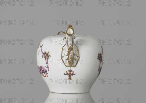 Teapot with lid, Koenigliche Porzellain Fabrique, Meissen (1710–1763); ca. 1750. Porcelain teapot with spherical belly tapering toward the base and flattened at the top; recessed flat lid with pine-cone–shaped handle. Bipartite handle with applied rocaille mounts fastened to the belly with volutes; zoomorphic spout with relief acanthus motifs and a spout-head with wide open mouth. Both sides of the body bear cartouche frames with purple draperies suspended by small bouquets of flowers and dry rocailles, topped and bottomed on the symmetry axis by brick-red draperies hung from plant branches. Within the cartouches are purple camaieu miniature landscapes with architecture: (1) a building with a defensive wall; (2) half-timbered buildings with a tower and a three-span bridge. Small colorful ornamental plant motifs under the handle and spout; two woodcut-style flowers and two insects on the lid; a small branch with a blue flower on the belly above the spout. Spout, handle, and edges of the...