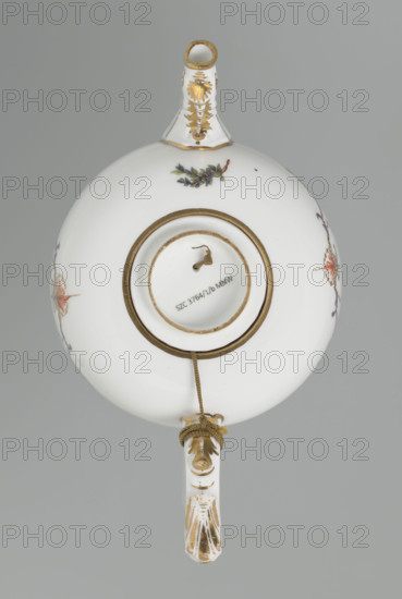 Teapot with lid, Koenigliche Porzellain Fabrique, Meissen (1710–1763); ca. 1750. Porcelain teapot with spherical belly tapering toward the base and flattened at the top; recessed flat lid with a pine-cone–shaped handle. Bipartite handle with plastic rocaille, mounted with volutes; zoomorphic spout with relief acanthus motifs and a wide-open spout-head. On both sides of the body are cartouche frames featuring purple draperies suspended from small bouquets of flowers and dry rocailles; brick-red draperies on the axis of symmetry. Within the cartouches are purple camaïeu miniature landscapes with architecture: (1) a building with a defensive wall; (2) half-timbered buildings with a tower and a three-span bridge. Small colorful ornamental plant motifs under the handle and spout, two woodcut flowers and two insects on the lid, and a small branch with a blue flower on the belly above the spout. Spout, handle, and edges of lid and spout are gilded. Paint chip near the bouquet of one cartouche...