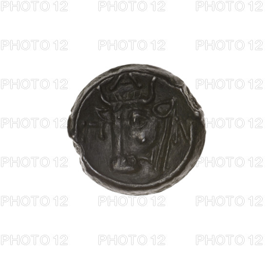 Bronze coin, Pantikapaion; obverse: head of bearded Satyr facing left; reverse: bull head facing left with letters on the sides and top. Iconography: Satyr head, bull head; subject: Satyr (mythology), bulls, animals. Date: 1st half of the 3rd century BC, Cimmerian Bosporus (Pantikapaion). Coin; diameter 17.6–18.1 mm; weight 3.93 g; axis 330°.