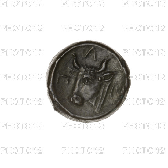 Bronze coin (Pantikapaion). Obverse: head of bearded Satyr facing left; Reverse: bull head facing left with letters on the sides and top. Iconography: Satyr, bull. 1st half of the 3rd century BC. Cimmerian Bosporus. Diameter: 17.5–18.0 mm. Weight: 4.78 g. Axis: 0°.