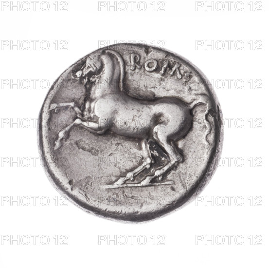 didrachma; publisher; Apollo (mythology); galloping horse; horses; head of Apollo. Obverse: head of Apollo in a laurel wreath turned to the right. Reverse: galloping horse to the left; above the inscription 'ROMA.' Date: 234–231 BC. Period: Roman Republic. Place: Rome. Object: coin. Diameter: 18.7 mm. Weight: 6.62 g. Axis: 180 degrees.