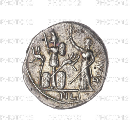 Denarius, M. Furius Philus (publisher), 119 BC. Obverse: head of Janus laureate; inscription M.FOVRI.LF. Beaded border. Reverse: Roma in Corinthian helmet, left hand with sceptre, right hand crowning a trophy; star above; inscription ROMA beside trophy; carnyx and shield on both sides of the trophy; below, inscription PHILI (PHI in ligature). Pearl border. Roman Republic (505–27 BC). Rome. Coin; diameter 19.7 mm; weight 3.80 g; axis 0°.