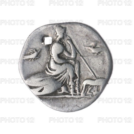 Denarius; Obv.: Head of Roma in a Corinthian helmet facing right; below the inscription; behind her the sign of value X. Beaded border. Rev.: Roma, wearing a Corinthian helmet, sits facing right on a stack of shields, holding a spear in her left hand; a helmet at her feet; in front of her a she-wolf feeding twins; on either side flying birds. Pearl border. 115–114 BC. Roman Republic. Rome. Coin; diameter 20.6 mm; weight 3.47 g; axis 180°.