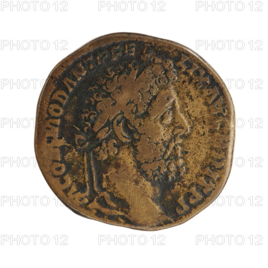 sestertius, Commodus (161–192; Roman emperor 177–192), issuer: Commodus; obverse: Head of Commodus in a laurel wreath to the right, inscription 'M COMMOD ANT P FE - LIX AVG BRIT PP' around; reverse: Roma seated on a shield to the left, holding Victoria in her outstretched right hand and a spear in her left, inscription 'ROM FEL PM TR - P XVI COS VI' around, 'IN SC' in fields; date: 190–191; Roman Empire (27 BC–476), Rome; coin (sestertius); weight 27.35 g; diameter ~29–30 mm; axis 180 degrees.