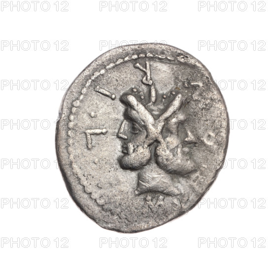 Denarius by M. Furius Philus, 119 BC. Obverse: head of Janus in a laurel wreath; inscription M.FOVRI.L.; beaded border. Reverse: Roma in a Corinthian helmet with a sceptre in his left hand, crowning a trophy with his right; above a star; inscription ROMA behind the trophy; a carnyx and a shield on both sides of the trophy; inscription PHILI (PHI in ligature) under the line; pearl border. Roman Republic (505–27 BC). Rome. Coin; diameter 18.9 mm; weight 3.72 g; axis 0°.
