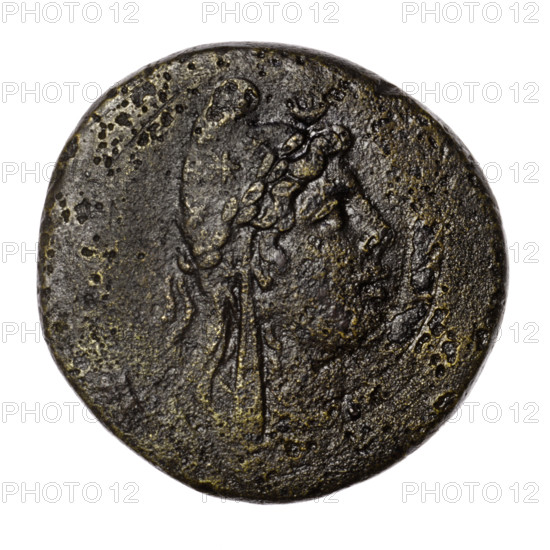 bronze coin, Pantikapaion; aw: head of Attys in a Phrygian cap decorated with stars and in a laurel wreath facing right, at the top a crescent and a star; rw: standing Dionysus in a short robe 3/4 to the left, holding a bunch of grapes in his right hand and a thyrsus with a ribbon in his left; a panther sits left at Dionysus's feet with its head turned; right field with a monogram; inscription in two rows on the sides; iconography: panthers, Dionysus, head of Attys, head of Men, crescent with a star, grapes, plants, male head, monograms; mythology: Dionysus, Attys, Men; material: bronze; city: Pantikapaion, Cimmerian Bosporus; date: 1st quarter of the 1st century BC (95–65 BC); coin; diameter 30.6–31.2 mm; weight 18.60 g; axis 0°