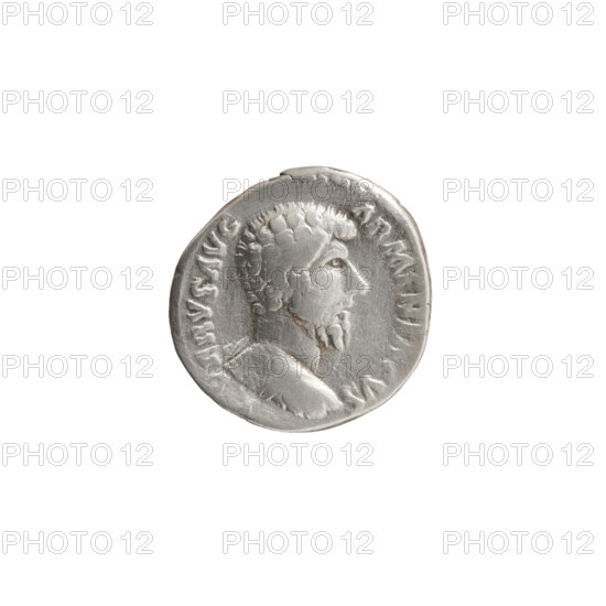 Denarius of Lucius Verus (130–169; Roman emperor 161–169). Obverse: Bust of Lucius Verus naked and in armor facing right, legend 'L VERVS AVG - ARMENIACVS'. Reverse: Mars standing right, holding a spear in his right hand and resting his left on a round shield on the ground, legend 'TR P IIII - IMP II COS II'. Date: 163–164. Roman Empire (27 BC–476), Rome. Coin; diameter 17.0 mm; weight 2.75 g; axis 180°.