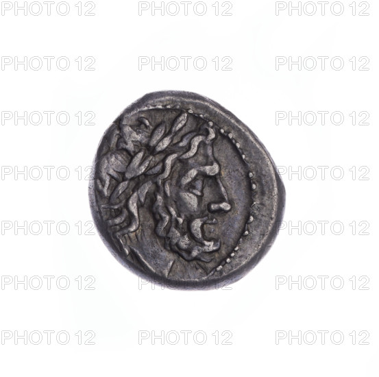 Jupiter (mythology), head of Jupiter; Wiktoria (personification) crowning trophies; Semerau-Siemianowski, Wladyslaw (1849–1938). Obverse: head of Jupiter in a laurel wreath at right. Pearl border. Reverse: Wiktoria crowning the trophy turned at right; under the line the inscription 'MA.' Continuous border. 211 BC, Roman Republic (505–27 BC), Rome. Coin: diameter 15.5 mm, weight 3.35 g, axis 225°.