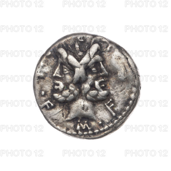 Denarius, M. Furius Philus (fl. 119 BC), Roman Republic, 119 BC. Obverse: Head of Janus in a laurel (wreath); around the inscription MF, .LF. Beaded border. Reverse: Roma, in a Corinthian helmet with a sceptre in his left hand, right hand crowning a trophy; above the trophy a star; behind it the inscription ROMA; on both sides of the trophy a carnyx and a shield; below the line the inscription PHILI (PHI in ligature). Pearl border. Bronze/Silver coin; diameter 18.4 mm; weight 3.85 g; axis 0°.