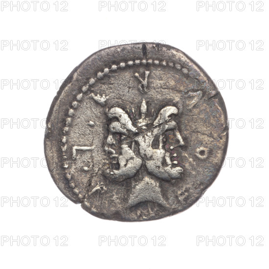 Denarius, M. Furius Philus (publisher), 119 BC. Obverse: Head of Janus in a laurel wreath; inscription M.FOVRI.LF.; beaded border. Reverse: Roma wearing a Corinthian helmet, holding a sceptre in left hand and crowning a trophy with right; above a star; on both sides of the trophy a carnyx and a shield; below the line the inscription PHILI (PHI in ligature); pearl border. Roman Republic, Rome; coin; diameter 20.1 mm; weight 3.66 g; axis 270°.