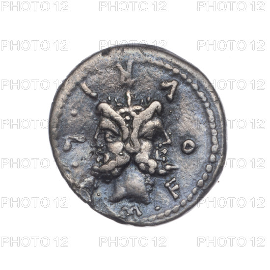 Denarius, M. Furius Philus (fl. 119 BC), Obv: Head of Janus in a laurel wreath; inscription M·FOVRI·L; beaded border. Rev: Roma in a Corinthian helmet, with a sceptre in her left hand, crowning a trophy with her right; above a star; behind the trophy the inscription ROMA; on both sides of the trophy a carnyx and a shield; under the line the inscription PHILI (PHI in ligature); pearl border. 119 BC, Roman Republic; Rome. Coin; diameter 19.4 mm; weight 3.38 g; axis 135°.
