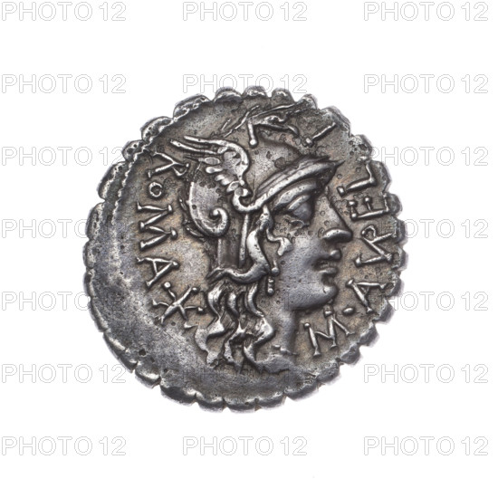 Denarius serratus, 118 BC, Roman Republic (505–27 BC). Obverse: Head of Roma in an Attic helmet facing right; before it the inscription M.AVRELI (VR in ligature); behind, ROMA and the value sign X (crossed out). Pearl border. Reverse: Naked warrior on a biga facing right, holding reins and a carnyx in the left hand, and a spear in the right; below the inscription SCAVRI (AVR in ligature); under the line LIC.CN.DOM. Pearl border. Makers/publishers: Aurelius Scaurus, M.; Licinius Crassus, L.; Domitius Ahenobarbus, Cn. Mint: Narbonne. Coin type: denarius serratus; material: silver. Diameter 19.1 mm; weight 3.83 g; axis 135°.