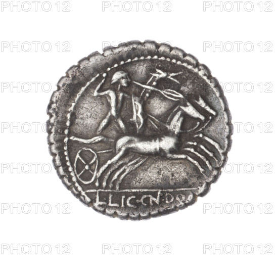 Denarius serratus; publishers: L. Cosconius (fl. 118 BC), L. Licinius Crassus (fl. 118 BC), Cn. Domitius Ahenobarbus (fl. 118–96 BC). Obverse: Head of Roma in an Attic helmet right; around inscription LC, OMF (S lying); behind it the sign of value X. Beaded border. Reverse: Naked warrior on a biga right, holding reins and a spear, with shield and carnyx in left hand; under the line the inscription L.LIC.CN.DO. Pearl border. 118 BC; Roman Republic (505–27 BC). Coin (Narbonne); diameter 19.8 mm; weight 3.82 g; axis 135°.