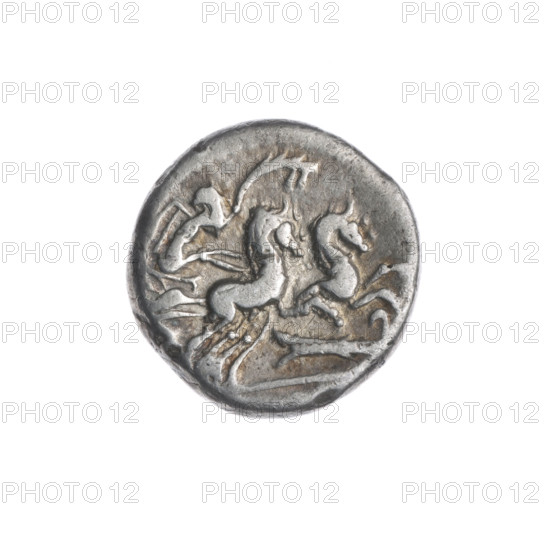 Denarius; issuer: M. Cipius (fl. 115–114 BC), publisher. Obverse: Head of Roma wearing a helmet facing right; in front the letter F; behind the helmet the sign of value X. Pearl border. Reverse: Victoria driving a biga to the right, holding reins in her left hand and a palm branch in her right; rudder below; inscription under the line. Pearl border. Bronze? or silver coin? (metal unspecified). Date: 115–114 BC. Roman Republic (505–27 BC). Place: Rome. Coin; diameter 16.0 mm; weight 3.87 g; axis 270°.