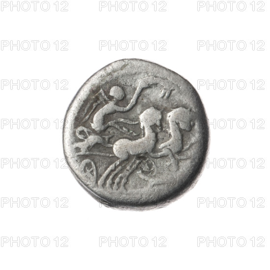 Denarius attributed to M. Cipius (fl. 115–114 BC). Obverse: head of Roma wearing a helmet facing right; in front, inscription; behind, value mark X. Pearl border. Reverse: Victoria driving a biga to the right, holding reins in left hand and a palm branch in right; rudder below; inscription under the line. Punch marks. Date: 115–114 BC (Roman Republic). Rome. Coin; diameter 16.5 mm; weight 3.72 g; axis 45°.