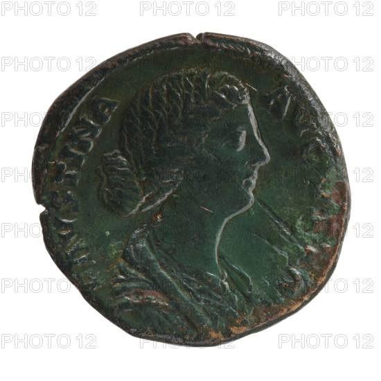 Sestertius, Faustina the Younger (ca. 130–176; Roman empress 161–176); issuer: Marcus Aurelius (121–180; Roman emperor 161–180). Obverse: Bust of Faustina II in drapery to the right, inscription FAVSTINA - AVG, STA all around. Reverse: Cybele in a turret crown, seated to the right between two lions, holding a drum on her knees with her left hand, inscription MATRI - M all around. Iconography: Cybele (mythology), Faustina the Younger, lions, drums, ancient deities. Date: 161–176. Culture/place: Roman Empire, Rome. Coin type: sestertius; material: coin. Measurements: diameter ~29–30 mm, weight 19.95 g, axis 195°.