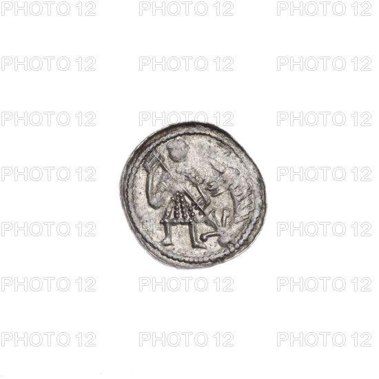 Denarius, Boleslaw III Krzywousty (prince of Poland; 1107–1138). Obverse: in the beaded border, a knight in chain mail thrusting a spearhead into the jaws of an upside-down dragon. Reverse: in the double beaded border, an isosceles cross topped with balls (two of them with one dot); between its arms, a single sun (one with a dot). Iconography: chain mail, spearhead (issue mark), equal-armed cross, crosses, jaws, martyrs, knight, dragons, dragon, spears, fight against pagans, fight between good and evil, Adalbert (Saint; ca. 956–997). Style: Romanesque. Date: ca. 1125–1138. Place: Poland, Kraków. Type: coin. Diameter: 12.6–13.1 mm. Weight: 0.48 g. State of preservation: very good.