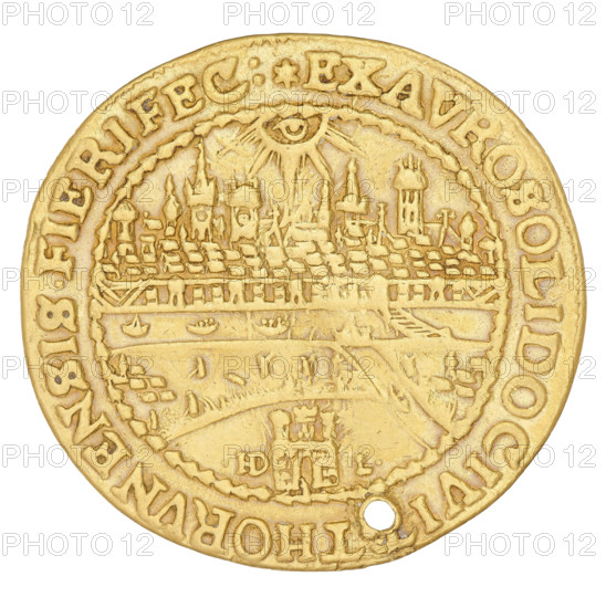 Torun donative — 2 ducats. Maker: Lauer, Hans Dawid (active 1649–1669). Issued under Michal Korybut Wisniowiecki (King of Poland, 1669–1673). Donative coin struck in Torun (Kuyavian-Pomeranian Voivodeship). Gold; Polish coin; crowns. Obverse: In the circumference the bust of Michal Korybut in a laurel wreath, turned to the right; rim inscription: MICHAEL.D G. REX POLO.MD L.RVS.PR. Reverse: W circumferential view of Torun, above it the Eye of Providence in rays, at the bottom the coat of arms of Torun and the letters .HD-L.; rim inscription divided at the top by an asterisk: *EX AVRO SOLIDO CIVIT. THORVNENSIS.FIERI FEC. Date: 1669–1673. Diameter 30 mm; weight 6.55 g; axis 180°., A round metallic object with a smooth golden surface showing an embossed cityscape scene in the center, including a skyline of clustered buildings with towers and spires above a patterned horizontal band and a bridge-like structure, with a stylized eye and rays depicted near the top of the scene; the rim bears r...