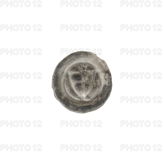 Denarius - bracteate; triangular shield with a cross whose arms reach the edge; trefoil above the shield; shields; cracked dies; one-sided coin; iconography: shield with cross I, trefoil, triangular shield; Teutonic Knights (order); ca. 1307/1308–ca. 1317/1318; coin (one-sided); diameter 14.5 mm; weight 0.20 g.