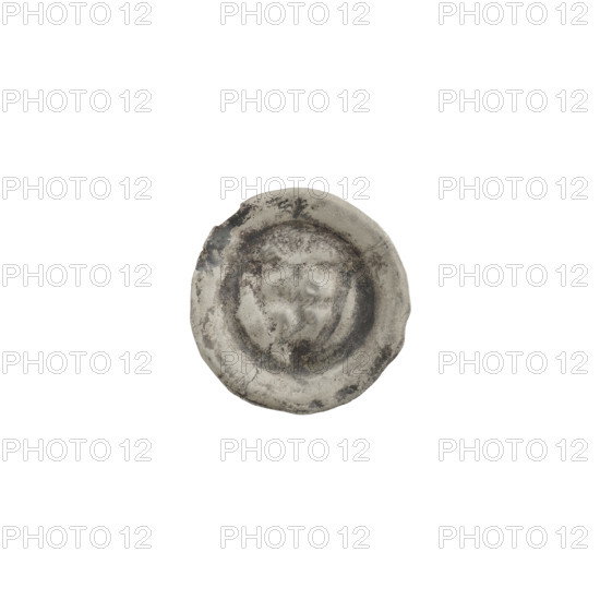 Denarius - bracteate; one-sided coin showing a triangular shield with a cross whose arms reach the edge; trefoil above the shield; cracked dies; shields; iconographic elements include shield with cross I, trefoil, triangular shield; Teutonic Knights (order); ca. 1307/1308–ca. 1317/1318; coin (one-sided); diameter 14.5 mm; weight 0.20 g