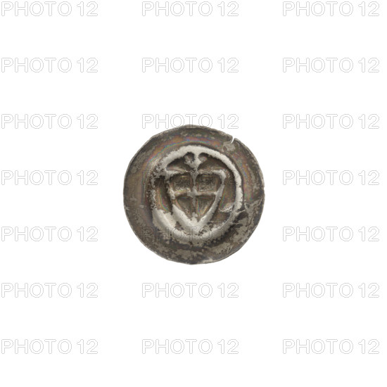 Denarius - bracteate, one-sided coin featuring a triangular shield with a cross whose arms reach the edge; above it, a trefoil; additional shields. Iconography: shield with a cross, trefoil, triangular shield. Issued by the Teutonic Knights (Order), ca. 1307/1308–ca. 1317/1318. Diameter 14.1 mm, weight 0.25 g.