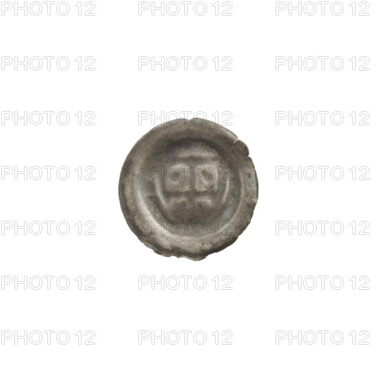 Denarius - bracteate, one-sided coin. Triangular shield with a cross whose arms reach the edge; one ball in each upper field of the shield. Other motifs: shield with a cross I (iconographic), balls, shields. Teutonic Knights (order). Date ca. 1307/1308–ca. 1317/1318. Material: coin (one-sided). Diameter 14.5 mm, weight 0.21 g.