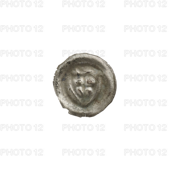 Denarius (bracteate), one-sided coin depicting a triangular shield with a cross whose arms reach the shield's edge; above the shield a trefoil-shaped cross. Iconography: shield with cross I, shields, triangular shield, trefoil. Attributed to the Teutonic Knights (Order). Date ca. 1307/1308–ca. 1317/1318. Material/format: coin (one-sided), diameter 14.7 mm, weight 0.23 g.