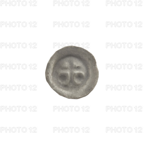 Denarius bracteate; one-sided coin featuring a Latin cross with slightly widening arm tips. On both sides of its longer arm is an equal-armed cross, the right-side cross slightly diagonal. Iconography: Latin cross, equal-armed crosses. Attributed to the Teutonic Knights; dated ca. 1317/1318–ca. 1327/1328. Diameter 14.3 mm; weight 0.22 g.