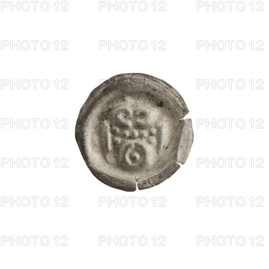 Denarius — bracteate imitation. One-sided coin depicting a gate topped with a trefoil, with seven round holes in the wall; one sphere at each corner; a ring beneath the arched vault of the gate. 13th century. Teutonic Knights (State of the Teutonic Order, 1226–1525). Diameter 17 mm, weight 0.21 g.