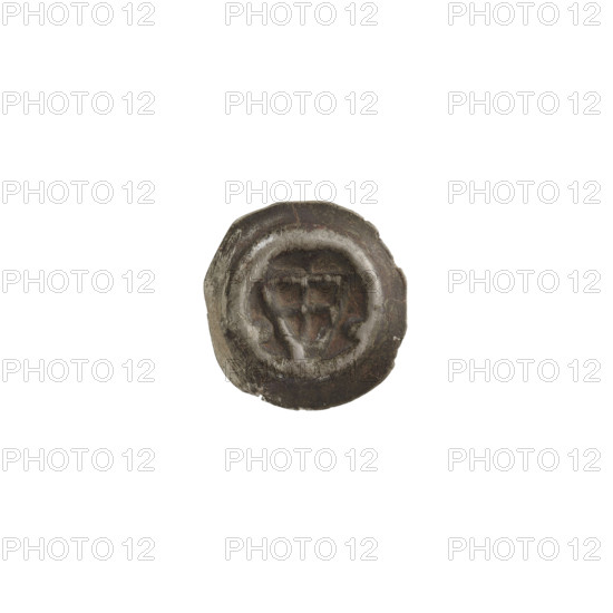 Denarius - bracteate; one-sided coin depicting a triangular shield with a cross whose arms reach the edge; one ball on each side of the shield; additional shields; illegible mark above the shield. Iconographic elements: shield with a cross I, triangular shield (iconographic), shields, balls. Teutonic Knights (order). Date ca. 1307/1308–ca. 1317/1318. Coin type: bracteate denarius; diameter 13.7 mm; weight 0.18 g.