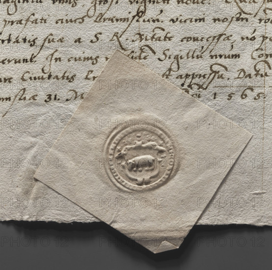 Round seal impression of the town of Przemysl, Ruthenian Voivodeship. In a decorative cartouche a bear striding to the right. Partially illegible rim inscription: PREMISL, 1561, Poland.