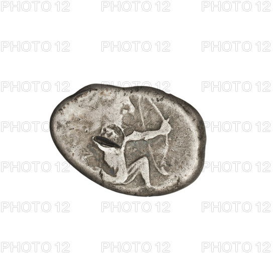Shekel (404–338 BC). Obverse: King Artaxerxes (Artaxerxes II/III) wearing a crown and long robe, turned right, kneeling on his right knee (fighting), holding a dagger in his right hand and a bow in his left. Reverse: incusum with a goat-head countermark. Persia (Sardis), Achaemenid period; coin. Diameter 11.5 × 17.5 mm, weight 5.30 g.