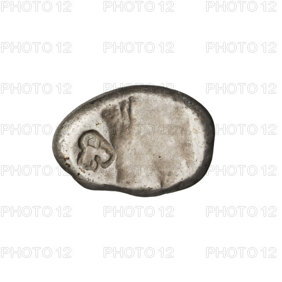 Shekel (404–338 BC). Obverse: King Artaxerxes (Artaxerxes III, 359–338 BC; Artaxerxes II, 404–358 BC) wearing a crown and long robe, turned right, kneeling on his right knee (fighting), holding a dagger in his right hand and a bow in his left. Reverse: incusum with a goat-head countermark. Persia (place of origin), Achaemenid period (550–330 BC). Sardis. Coin; diameter 11.5 × 17.5 mm; weight 5.30 g.