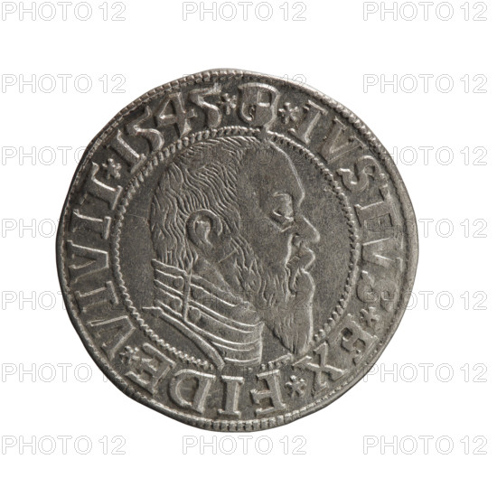 grosz; publisher: Schilling, Maciej; die-cutter: Decjusz, Jost Ludwik (fl. 1528–1535); subject: Albrecht Hohenzollern (Prince of Prussia; 1490–1568); iconography: eagles, Hohenzollern coat of arms, male busts in armour. Obverse: Prussian eagle, on its chest a crowned letter S; in the rim between pearl borders an inscription beginning with a trefoil ALBER*D*G*MAR*BRAN*DVX*PRVSS. Reverse: male bust in armour in profile turned to the right; short hair, long pointed beard with sideburns; inner rim divided by Hohenzollern shield; inscription beginning with *IVSTVS*EX*FIDE*VIVIT*I545*. Date: 1545. Place: Ducal Prussia (1525–1701), Königsberg. Object: coin (grosz). Measurements: diameter 23.5 mm; weight 1.86 g; axis 270°.
