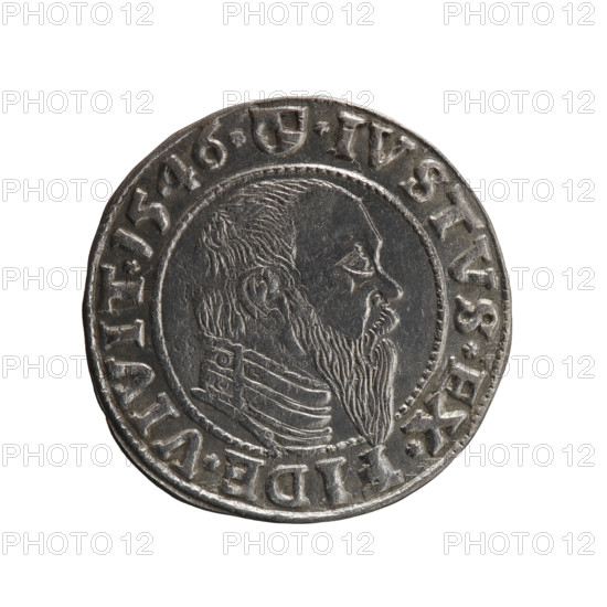 Albrecht Hohenzollern (Prince of Prussia; 1490–1568). Obverse: Prussian eagle, on its chest the crowned letter S; in the rim, between pearl-shaped borders, inscription beginning with a trefoil ALBER*D*G*MAR*BRAN*DVX*PRVS. Reverse: male bust in armor in profile turned to the right; short hair, long pointed beard with sideburns, dividing the inner border; in the rim, between pearl-shaped borders, inscription beginning with the Hohenzollern shield *IVSTVS*EX*, DE*VIVIT*I546*; date 1546. Ducal Prussia (1525–1701), Königsberg. Coin; diameter 23.1 mm; weight 1.97 g; axis 270°. Maker: Grosz, Schilling, Maciej.