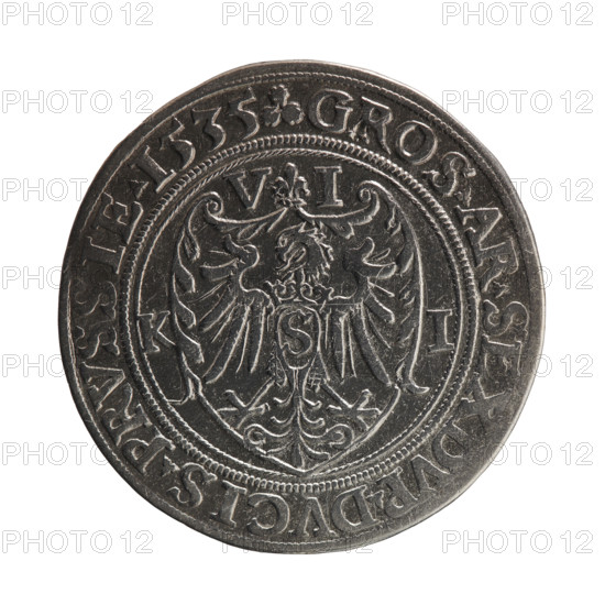 wieczorowy, Decjusz, Jost Ludwik (fl. 1528–1535); Albrecht Hohenzollern (Prince of Prussia; 1490–1568) — iconography: lily, eagles, male busts in armour, Hohenzollern coat of arms. Obverse: male bust in armour in profile turned to the right; short hair, beard with sideburns. In the rim, between continuous borders, an inscription beginning with the Hohenzollern shield ALBERTVS DG MAR BRAN DVX PRV, with plant motifs between words. Reverse: in a double beaded border, a shield topped with a lily; top and sides decorated with floral tendrils. The shield features a Prussian eagle with a crowned letter S on its breast. Above the shield, beside the fleur-de-lis, the numerals VI; on the sides of the shield, KI. In the rim, an inscription beginning with a floral motif GROS AR SEXDVP DVCIS PRVSSIE 1535, with floral motifs between words. Pearl border. 1535; Ducal Prussia (1525–1701), Königsberg. Coin: diameter 29.2 mm, weight 5.11 g, axis 225°.
