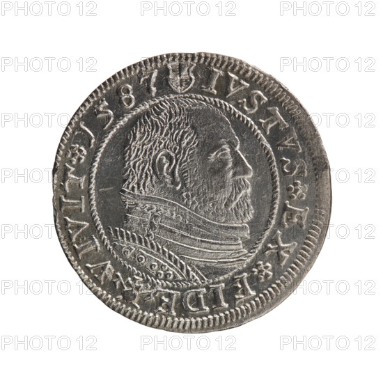 Obverse: Prussian eagle with crowned letter S on the chest, dividing the inner border; in the rim between the borders an inscription beginning with a rosette GEORG.FRID:D:G:M:BR:DVX.PRVSS; rosettes. Reverse: Male bust in armour in profile turned to the right; short hair, beard with sideburns; in the rim between the borders an inscription beginning with the Hohenzollern coat of arms and divided by a ring topped with a cross with crossed hooks IVSTVS EX FIDE - VIVIT; rosettes. Iconography: George Frederick (Duke of Karniów; 1539–1603) — male busts in armour, Hohenzollern coat of arms, eagles, rosettes. Date: 1587. Place: Ducal Prussia, Königsberg. Object: coin; diameter 22.3 mm; thickness 1.94 mm; axis 0°. Maker/publisher: Gulden, Pawel.