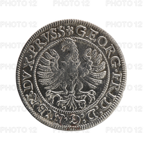 George Frederick (Duke of Karniów; 1539–1603) — iconography: Hohenzollern coat of arms, eagles, male busts in armour, rosettes. Obverse: Prussian eagle with crowned letter S on the chest; in the rim between borders an inscription beginning with a rosette GEORG.FRID:D:G:M:BR:DVX.PRVSS with circles between words. Reverse: male bust in armour in profile turned right; short hair, beard with sideburns; in the rim between borders an inscription beginning with the Hohenzollern coat of arms and divided by a ring topped with a cross with crossed hooks IVSTVS EX FIDE - VIVIT 1587, rosettes. Ducal Prussia (1525–1701), Königsberg; coin; diameter 22.3 mm; weight 1.57 g; axis 0°.