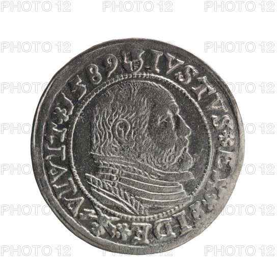 Obv. Prussian eagle with the crowned letter S on the chest. In the rim, between the borders, an inscription beginning with a rosette GEORG.FRID:D:G:M:BR:DVX.PRVSS points between the words. Rev. Male bust in armour in profile turned to the right; short hair, beard with sideburns. In the rim, between the borders, an inscription beginning with the Hohenzollern coat of arms and divided by a ring topped with a cross with crossed hooks IVSTVS EX FIDE - VIVIT I589 between the words rosettes. 1589. Ducal Prussia (1525–1701), Königsberg. Coin; diameter 22.5 mm, weight 1.70 g, axis 0°. Maker: Gulden, Pawel; publisher: Gulden, Pawel. Subjects/icons: eagles, George Frederick (Duke of Karniów; 1539–1603) — iconography, Hohenzollern (coat of arms), rosettes, male busts in armour.