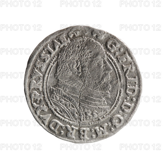 Trojak (coin) by Pawel Gulden, obverse: male bust in armour in profile turned to the right, short hair, beard with sideburns, separating the inner double border (inner continuous, outer pearly); rim inscription beginning with an ornament: G:FRID:D:G:M:BR:DVX.PRVSSIAE with dots between words. Reverse: continuous border with a seven-line inscription: III /GROSS:AR:/TRIPLEX./GEORG.FRID:/DVC:PRVSS:/ I588, denomination and date between rosettes, mint mark below the inscription. 1588. Ducal Prussia (1525–1701), Königsberg. Coin, diameter 22.0 mm, weight 2.47 g, axis 0°.