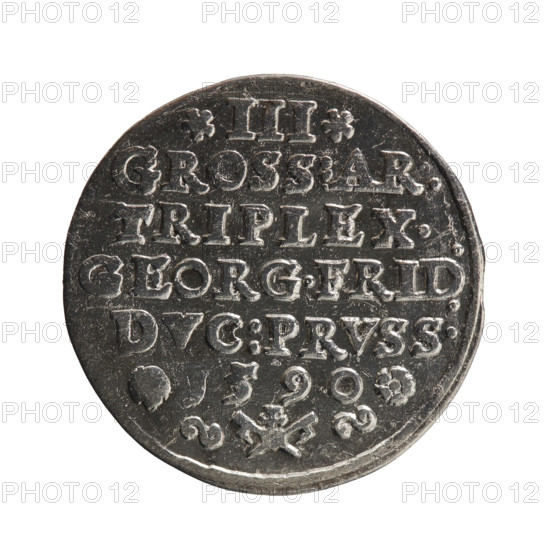 Trojak, Gulden Pawel (publisher). Jerzy Fryderyk (Duke of Karniów; 1539–1603) — iconography: rosettes, male busts in armour. Obverse: male bust in armour in profile to the right, separating the inner double border (inner continuous, outer pearly); short hair, beard with sideburns. In the rim an inscription beginning with ornament: G:FRID:D:G:M:BR:DVX.PRVSSIAE; outer continuous border. Reverse: in the continuous border an inscription in seven lines: III / GROSS:AR:/TRIPLEX./GEORG.FRID:/DVC:PRVSS./; denomination and date I590 between rosettes; below the inscription the mint mark. Date: 1590. Place: Ducal Prussia (1525–1701), Königsberg. Object: coin; diameter 22.3 mm; weight 2.57 g; axis 0°.