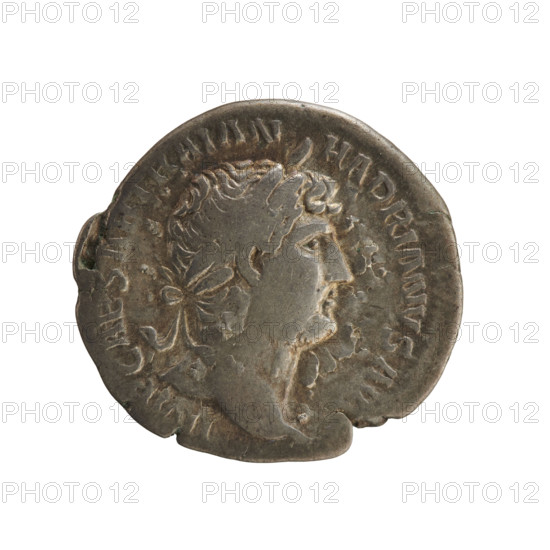 Denarius, Hadrian (76–138; Roman emperor 117–138). Obverse: head of the emperor with a laurel wreath to the right, inscribed 'IMP CAESAR TRAIAN HADRIANVS AVG.' Reverse: Roma in Amazon costume facing left, holding Victoria in her hands and a spear in her left, inscribed 'PM TR P COS III.' Dated 119–122 CE, Roman Empire (27 BC–476), minted in Rome. Coin; weight 3.14 g; axis 180°.