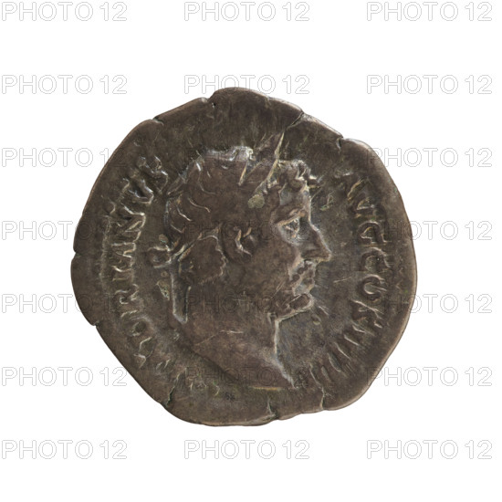 Denarius, Hadrian (76–138; Roman emperor 117–138). Obverse: HADRIANVS AVG COS III PP — Emperor's head with a laurel wreath facing right. Reverse: TELLVS STABIL — Tellus standing turned left, holding a plough in her right hand and a rake in her left; two ears of corn in a field. Attributes: plough, ears of corn; imperial bust. Style: Roman coin iconography. Date: 134–138. Place: Rome, Roman Empire (27 BC–476). Medium: silver coin. Weight: 3.08 g. Axis: 180 degrees.