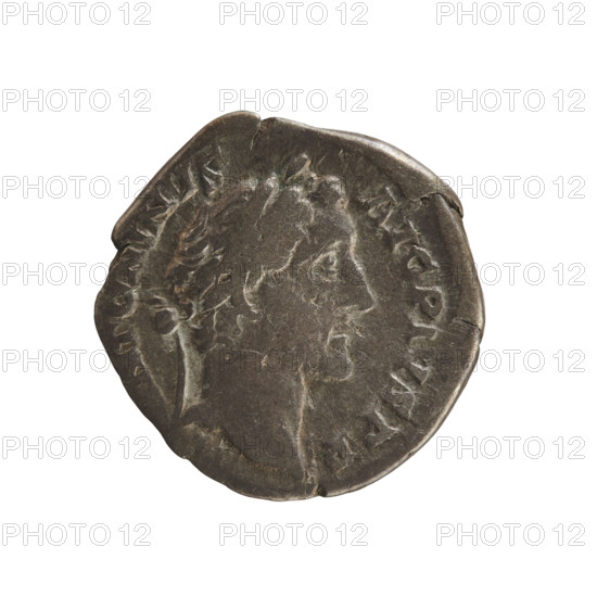 Denarius of Antoninus Pius (86–161; Roman emperor 138–161). Obverse: Emperor's head in a laurel wreath facing right with inscription NTONINVS AVG PIVS PP. Reverse: Clasped hands on a caduceus and two ears of corn with inscription C O S I I I. Iconography: hands joined on a caduceus and ears of corn; imperial bust. Date: 145–161. Culture: Roman Empire (27 BC–476), Rome. Medium: coin; diameter 17.8 mm, weight 3.14 g.